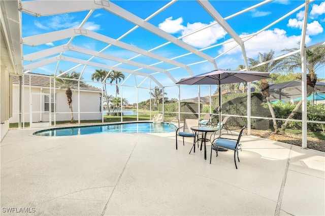 view of pool with a lanai and a patio area