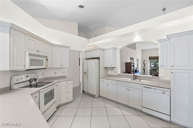 kitchen featuring white cabinetry, sink, and white appliances