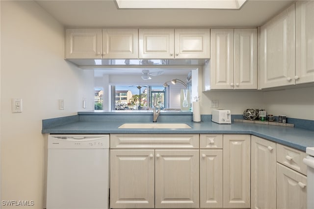 kitchen with dishwasher, ceiling fan, and sink