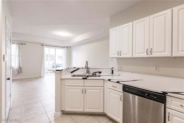 kitchen featuring dishwasher, white cabinets, and sink