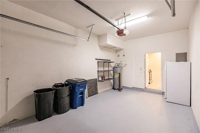 garage with white refrigerator, a garage door opener, and water heater