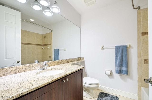 full bathroom with tile patterned floors, vanity, toilet, and tiled shower / bath combo