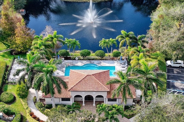 birds eye view of property featuring a water view