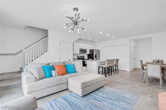 living room featuring a chandelier