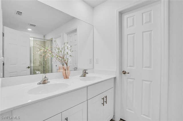 bathroom with vanity and walk in shower