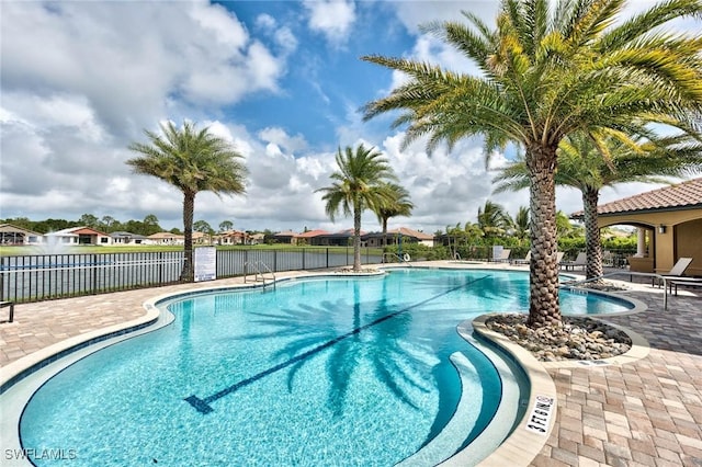 view of pool featuring a patio