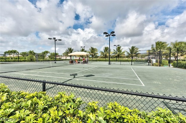 view of tennis court with a gazebo