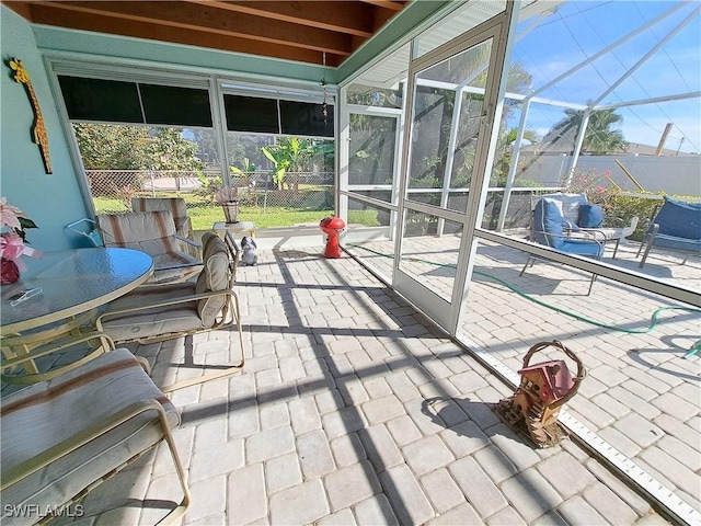 sunroom / solarium with a healthy amount of sunlight