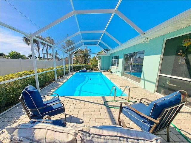 1727 Lakeview Blvd, North Fort Myers, FL 33903 - view of swimming pool with a patio area, fence, and glass enclosure