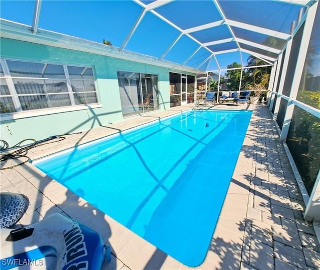 1727 Lakeview Blvd, North Fort Myers, FL 33903 - outdoor pool featuring a patio and glass enclosure