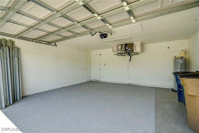 garage featuring a garage door opener and water heater