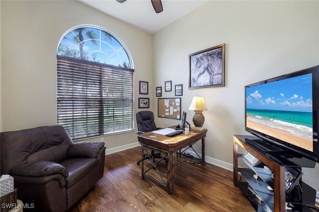 office space with ceiling fan, a wealth of natural light, and dark hardwood / wood-style flooring