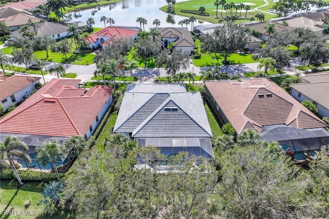 drone / aerial view with a water view