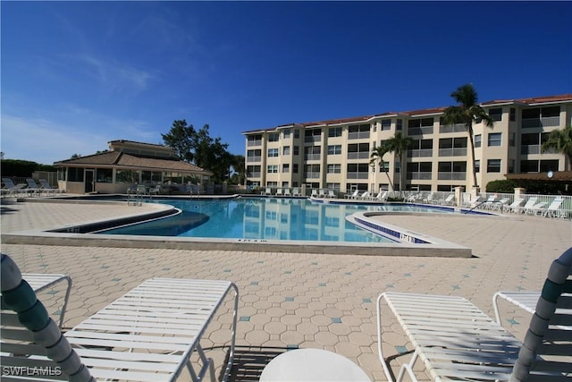 4009 Palm Tree Blvd Unit 403, Cape Coral, FL 33904 - pool featuring a patio area