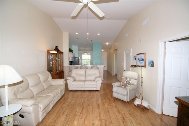 4009 Palm Tree Blvd Unit 403, Cape Coral, FL 33904 - living room with a ceiling fan, high vaulted ceiling, visible vents, and light wood finished floors