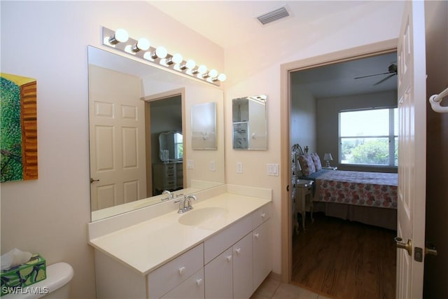 4009 Palm Tree Blvd Unit 403, Cape Coral, FL 33904 - bathroom featuring visible vents, tile patterned flooring, toilet, and vanity