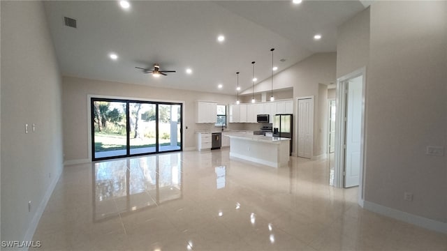 unfurnished living room featuring a ceiling fan, baseboards, visible vents, high vaulted ceiling, and recessed lighting