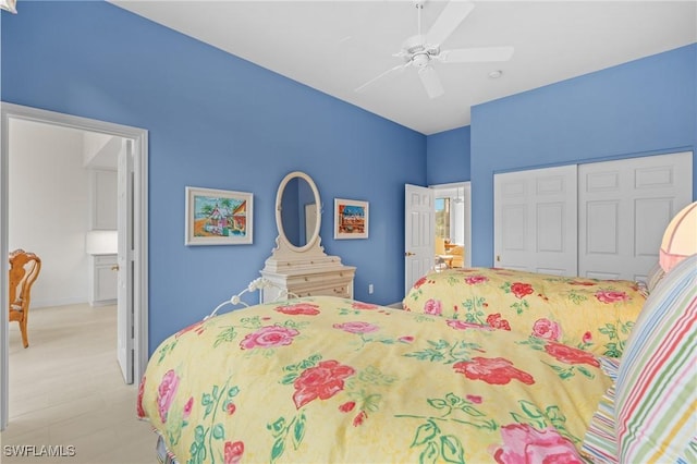 bedroom with ceiling fan and a closet