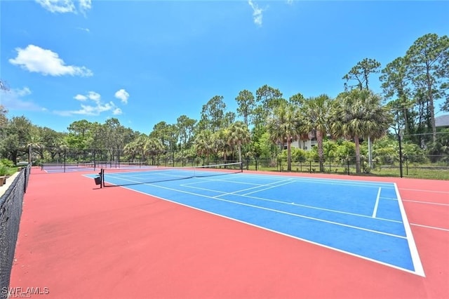 view of tennis court featuring basketball court