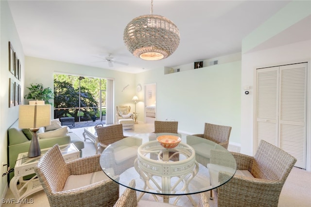 dining room featuring ceiling fan