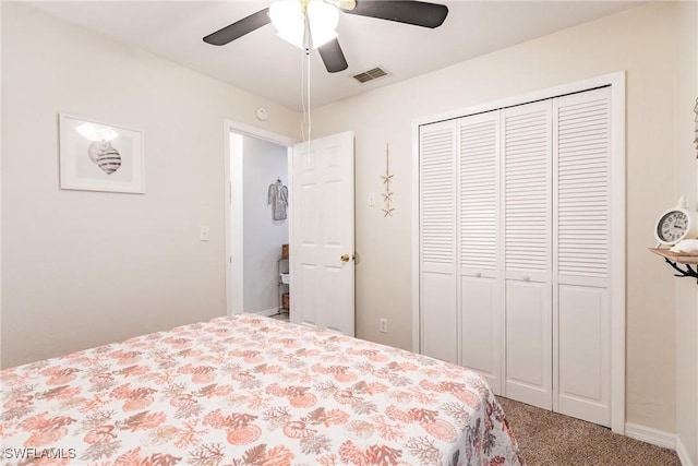 carpeted bedroom featuring ceiling fan and a closet