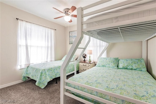 bedroom featuring ceiling fan and carpet floors