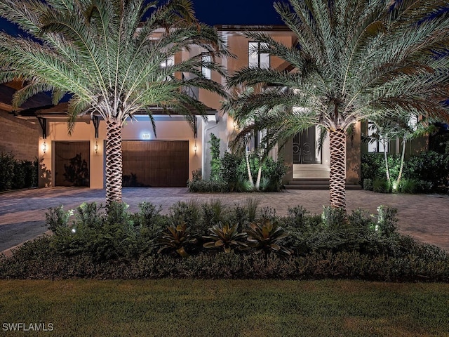 view of front of home with a garage