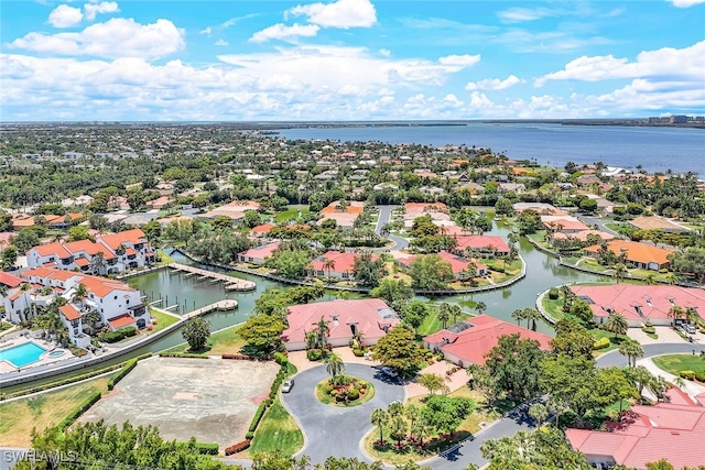 drone / aerial view with a water view