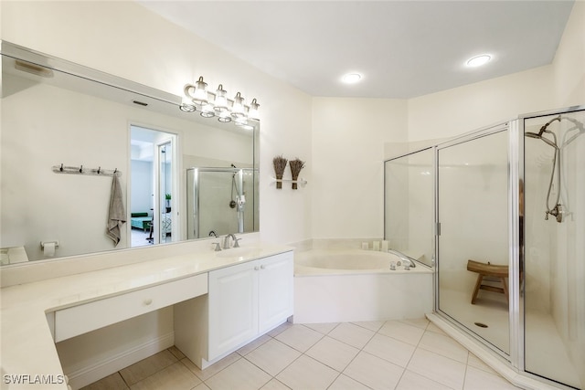 bathroom featuring tile patterned floors, separate shower and tub, and vanity