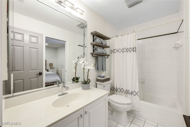 full bathroom featuring tile patterned flooring, shower / bath combination with curtain, vanity, and toilet