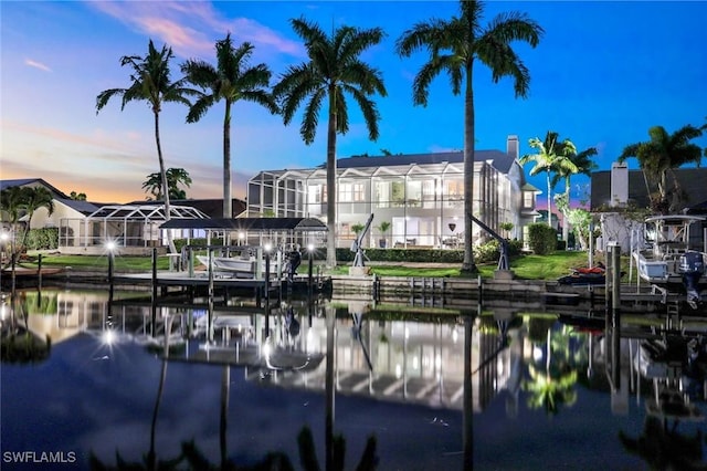 property view of water with a dock