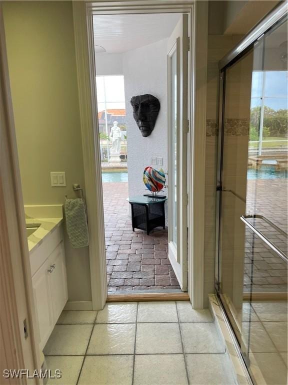 bathroom with vanity and tile patterned floors