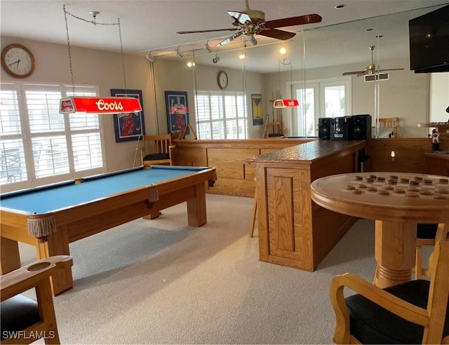 rec room featuring a healthy amount of sunlight, light colored carpet, ceiling fan, and billiards