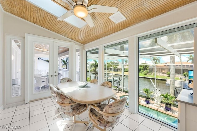 sunroom / solarium with french doors, ceiling fan, vaulted ceiling, and wooden ceiling