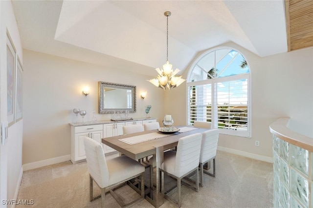 dining space with light colored carpet, vaulted ceiling, and a notable chandelier