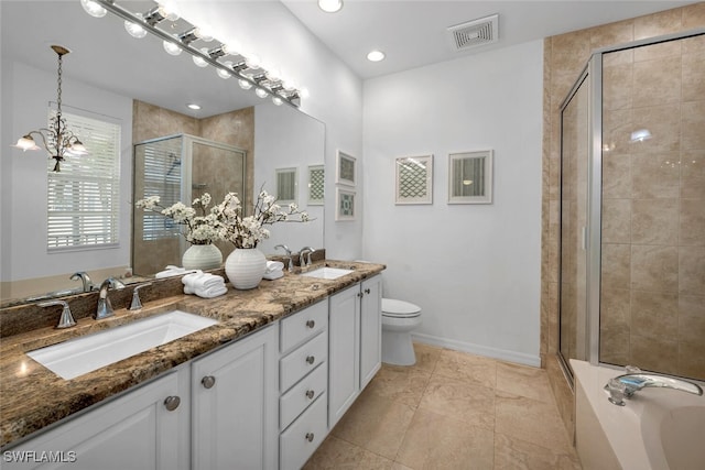 bathroom featuring vanity, a shower with door, a notable chandelier, tile patterned flooring, and toilet