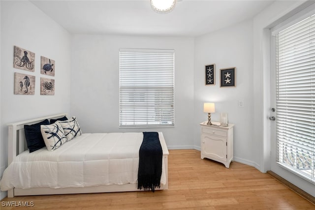 bedroom with light wood-type flooring