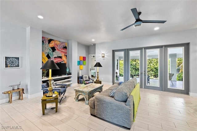 living room featuring ceiling fan