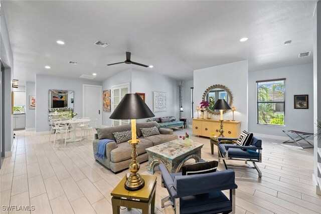 living room featuring ceiling fan