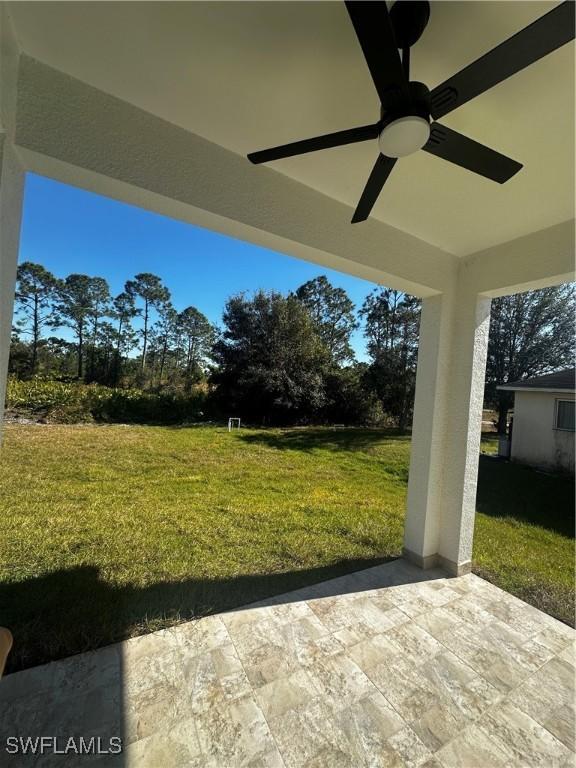 view of patio / terrace with ceiling fan