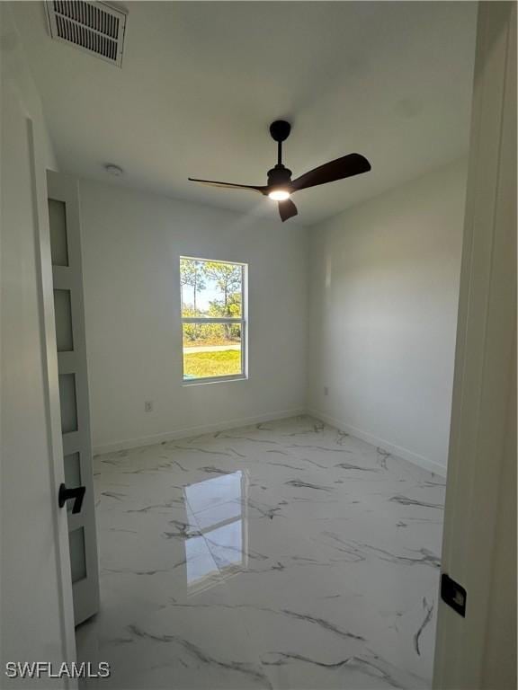 unfurnished room featuring ceiling fan