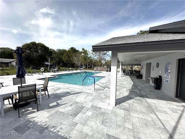 view of pool with a patio area