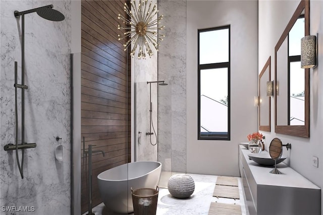 bathroom with vanity, shower with separate bathtub, a high ceiling, and an inviting chandelier