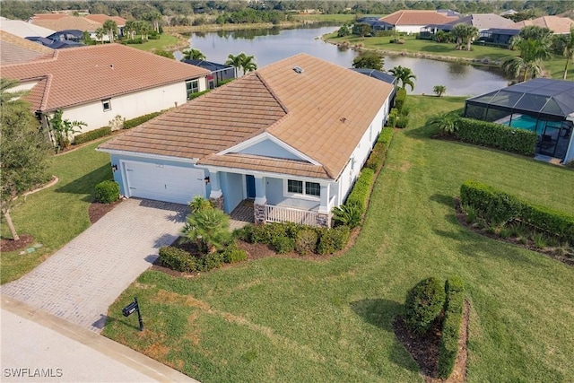 birds eye view of property featuring a water view