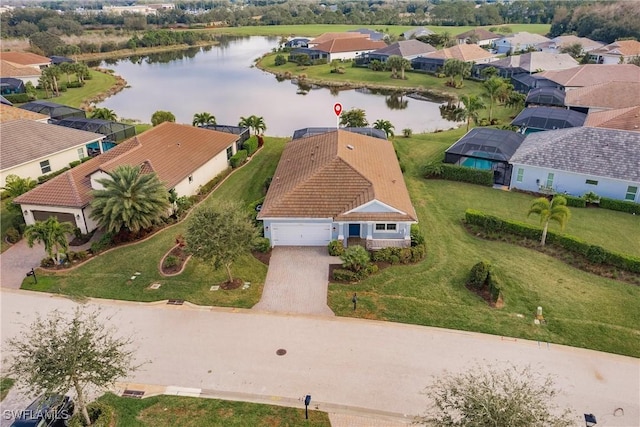 drone / aerial view featuring a water view