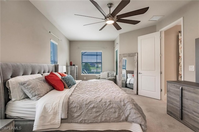 carpeted bedroom featuring ceiling fan