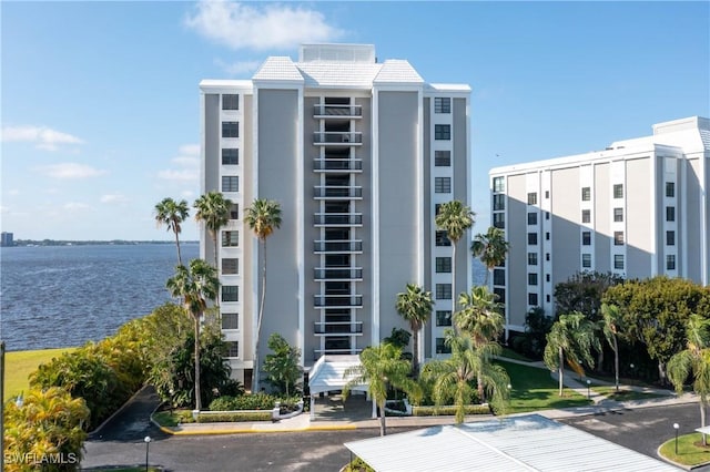 view of building exterior featuring a water view