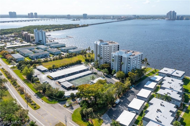 aerial view featuring a water view and a view of city