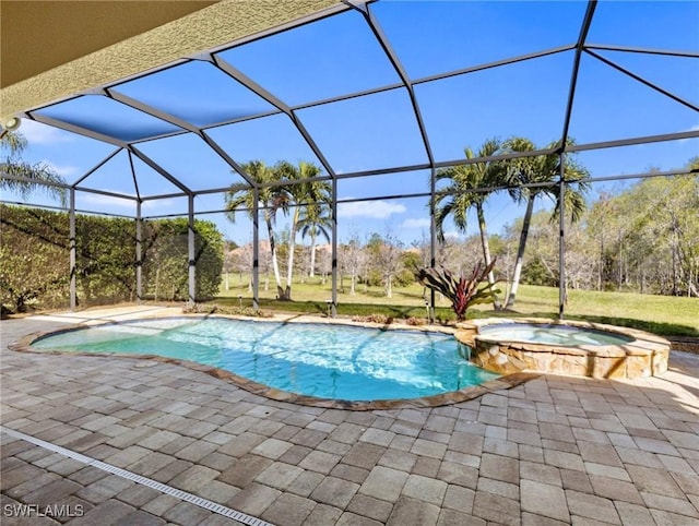 view of swimming pool featuring glass enclosure, a patio area, and an in ground hot tub