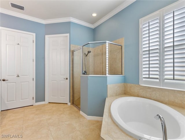 bathroom featuring ornamental molding, shower with separate bathtub, and tile patterned floors